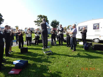 National Finals 2016, the band warming up in the sun at the Caravan Club at the racecourse